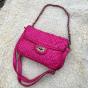 Small leather braided pouch bag with clasp - JENNY Couleur : Fuchsia